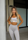 grey sports bra, grey crop top, high-waisted flare leggings, 411 official, four one one, grey leggings, flare leggings, activewear