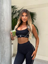 black sports bra, black crop top, high-waisted flare leggings, 411 official, four one one, black leggings, flare leggings, activewear