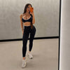 411 Official Core sculpting high-waisted leggings in black seamless women's gym leggings with contouring fit.