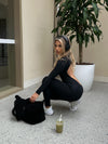 LUXE LONG SLEEVE BACKLESS JUMPSUIT BLACK PRE-ORDER