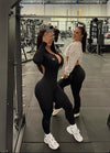 LUXE LONG SLEEVE BACKLESS JUMPSUIT BLACK PRE-ORDER